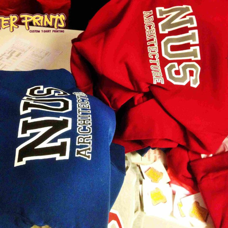 Pile of printed NUS Architecture class tees
